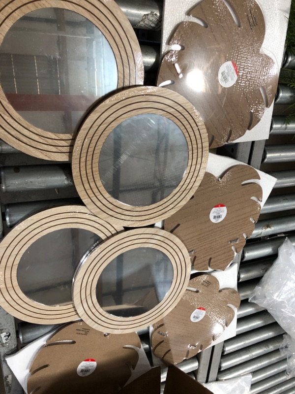 Photo 1 of 12" wall decorative mirror- 8 pack 

