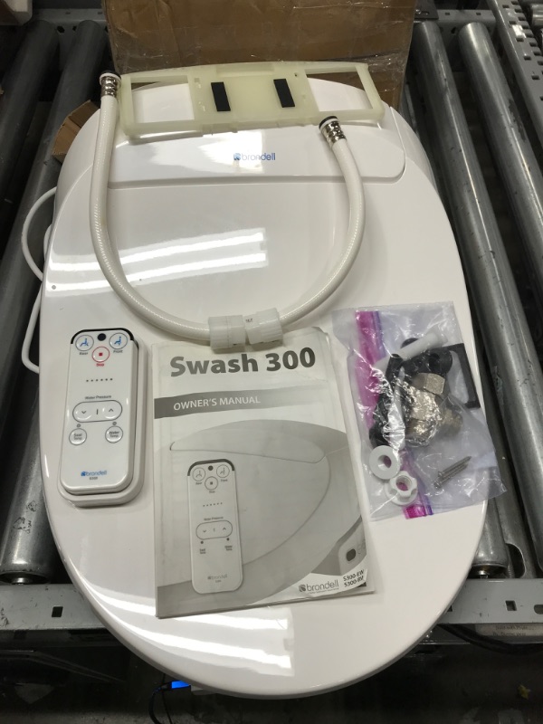 Photo 5 of ***** Tested, remote works****
****Tested, seat powers on****
Brondell Inc. S300-EW Swash 300 Elongated Advanced Bidet Toilet Seat, White