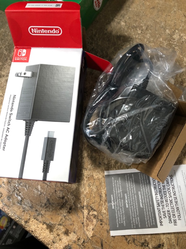 Photo 2 of **BUNDLE OF 2**
--Turtle Wax 2pk Seat Wedge Organizer
--Nintendo Switch AC Adapter
