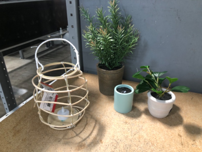 Photo 2 of -BUNDLE OF 4- 3 FUAX PLANT AND ONE BASKET WITH LED CANDLE (ONE PLANT IS MISSING AND BASKET HAS MINOR DAMAGE)