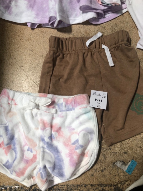 Photo 2 of *****ASSORTED BABY/TODDLER GIRL CLOTHES (8 ITEMS) 2 18M SHORTS, 1 3T SHIRT, 1 4T SHIRT, 3 5T BOTTOMS, AND 1 XSMALL T-SHIRT