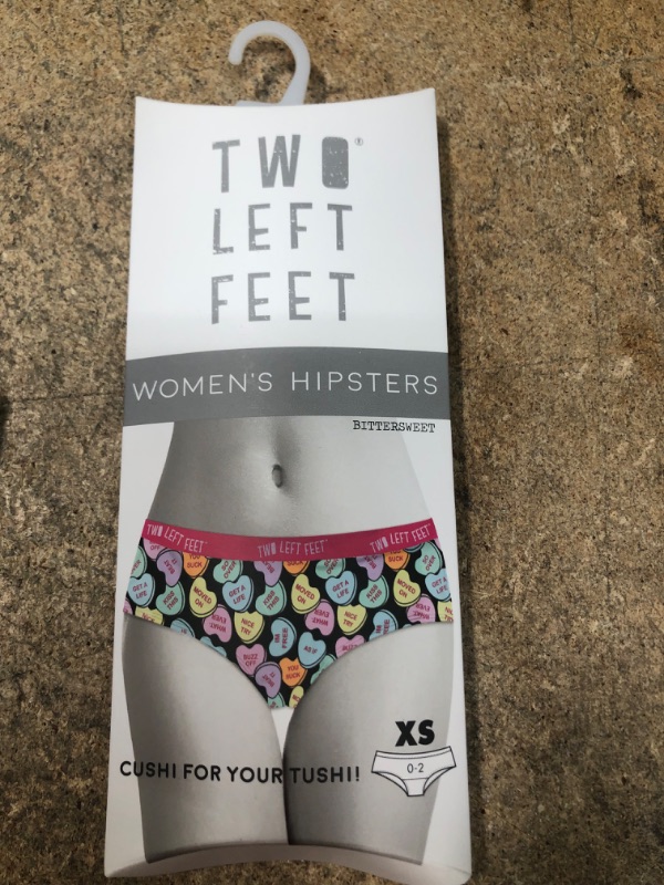 Photo 1 of bundle of 2 items 
Two Left Feet Unisex-Adult's (size: XS)    &    Fruit of the Loom Big Girls' Cotton Built-Up Stretch Sports Bra (size: 28)
