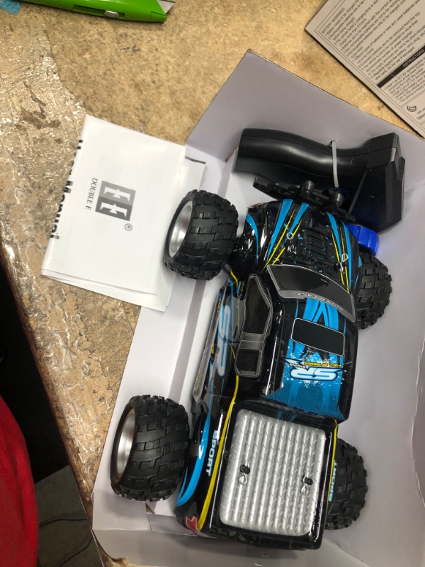 Photo 2 of DOUBLE E Remote Control Car,4WD High Speed Off Road RC Monster Car All Terrains Vehicle Truck with Rechargeable Battery for Boys Kids
