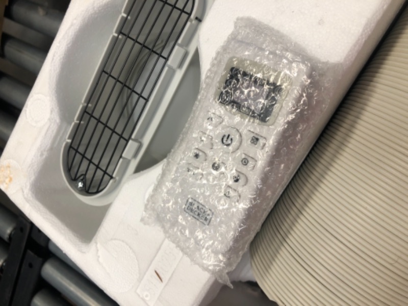 Photo 3 of BLACK+DECKER 14,000 BTU Portable Air Conditioner with Remote Control, White

-small dent 
-blows ice cold 