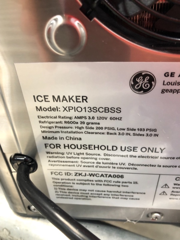 Photo 8 of PARTS ONLY 
GE Profile Opal 2.0 | Countertop Nugget Ice Maker with Side Tank | Ice Machine with WiFi Connectivity | Smart Home Kitchen Essentials | Stainless Steel

-powers on 
small dent 