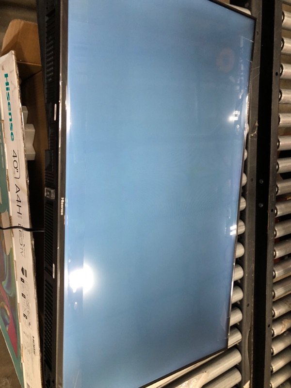 Photo 1 of PARTS ONLY SCREEN DOES NOT DISPLAY CORRECTLY 
Hisense A4 Series 40-Inch FHD Smart Android TV with DTS Virtual X, Game & Sports Modes, Chromecast Built-in, Alexa Compatibility (40A4H, 2022 New Model)