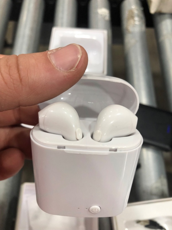 Photo 2 of 2 ITEM 
ONE PAIR DOES NOT POWER ON ONE DAMAGED EAR BUD 
i7S TWS Bluetooth Wireless Earbuds (x2)