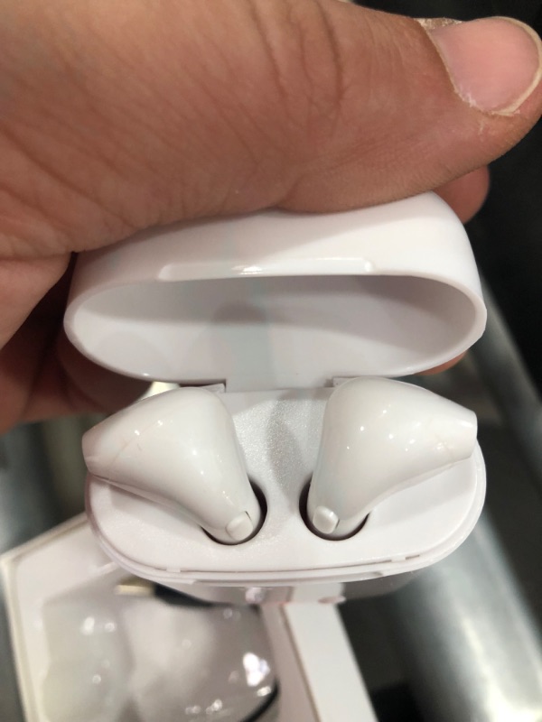 Photo 3 of 2 ITEM 
ONE PAIR DOES NOT POWER ON ONE DAMAGED EAR BUD 
i7S TWS Bluetooth Wireless Earbuds (x2)