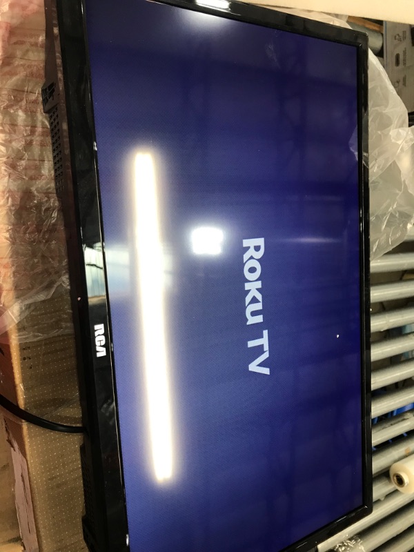 Photo 2 of RCA 24-inch Flat Screen 720p Roku Smart LED TV - RTR2461, 2022 Model
