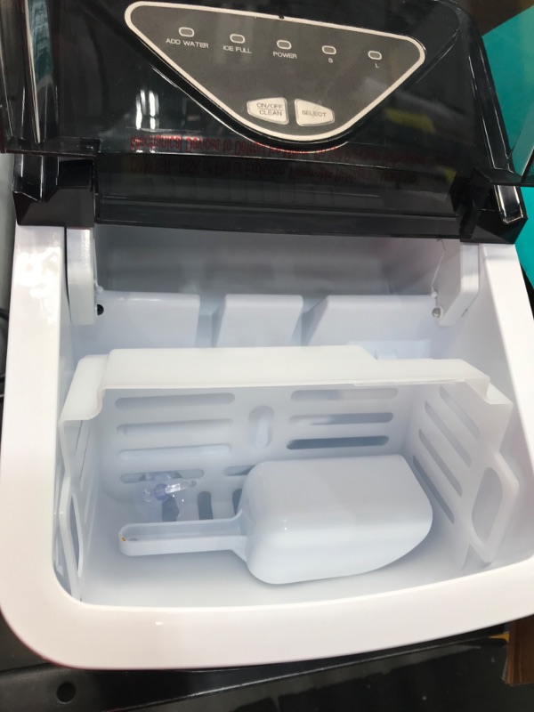 Photo 2 of *** NONFUNCTIONAL ***
Silonn Ice Makers Countertop, 9 Cubes Ready in 6 Mins, 26lbs in 24Hrs, Self-Cleaning Ice Machine with Ice Scoop and Basket, 2 Sizes of Bullet Ice for Home Kitchen Office Bar Party