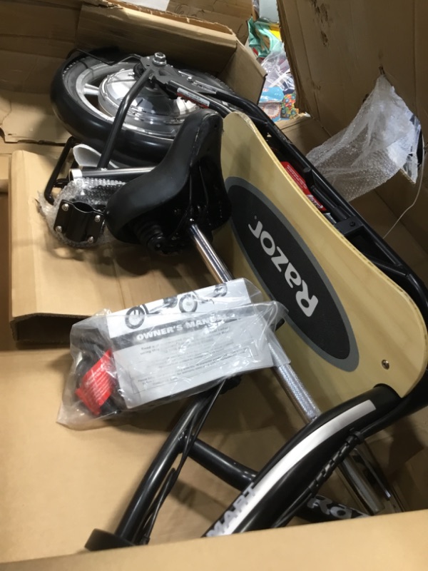 Photo 8 of **PARTS ONLY**
Razor EcoSmart Metro HD Electric Scooter with Padded Seat, for Ages 16+ and up to 220 lbs, 16" Pneumatic Tires, 350W Hub Motor, Up to 15.5 mph and 15.5-mile Range, 36V Sealed Lead-Acid Battery
