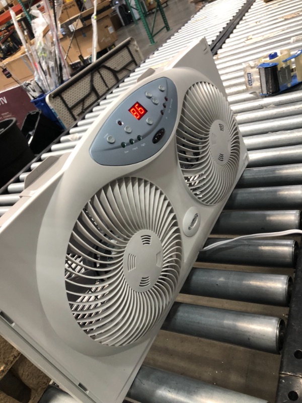 Photo 1 of Bionaire Window Fan with Twin 8.5-Inch Reversible Airflow Blades and Remote Control, White
