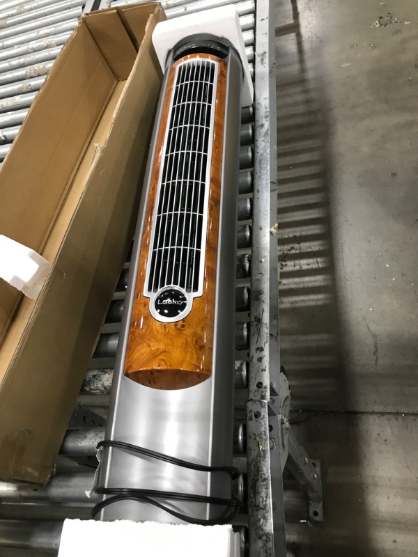 Photo 1 of Lasko Wind Curve Tower Fan with Nighttime Setting, Gray/Woodgrain,
