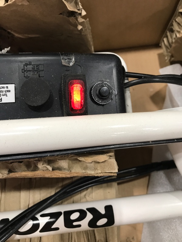 Photo 1 of Razor E200S Seated Electric Scooter, for Ages 13+ and up to 154 lbs, 8" Pneumatic Front Tire, 200W Chain Motor, Up to 12 mph & up to 8-mile Range, 24V Sealed Lead-Acid Battery
