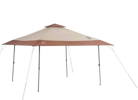 Photo 1 of **THE BAG HAS RIPPED**
Coleman Instant Beach Canopy 13' x 13' - Tan

