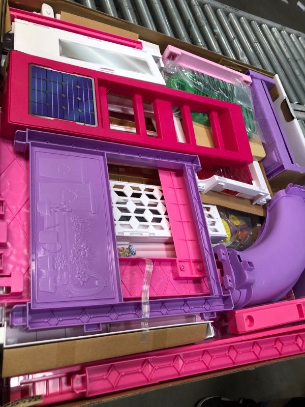 Photo 1 of Barbie Dreamhouse Dollhouse with Wheelchair Accessible Elevator, Pool, Slide and 70 Accessories Including Furniture and Household Items, Gift for 3 to 7 Year Olds
