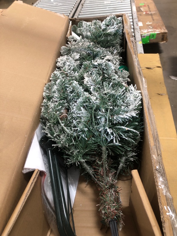 Photo 2 of Puleo International 4.5 Foot Pre-Lit Flocked Bennington Fir Artificial Christmas Tree with 150 UL-Listed Clear Lights
