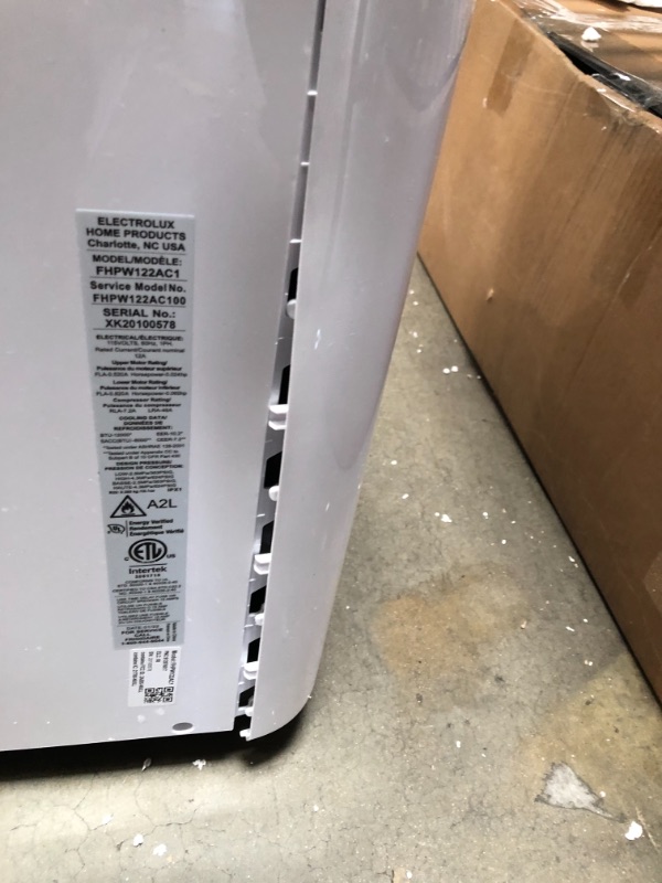 Photo 8 of **PARTS ONLY**

FHPW122AC1 Portable Air Conditioner with 12000 BTU Cooling Capacity 115 Volts 11 Amps 7.2 CEER Remote and 3 Fan
**SIDE IS CRACKED OPEN**