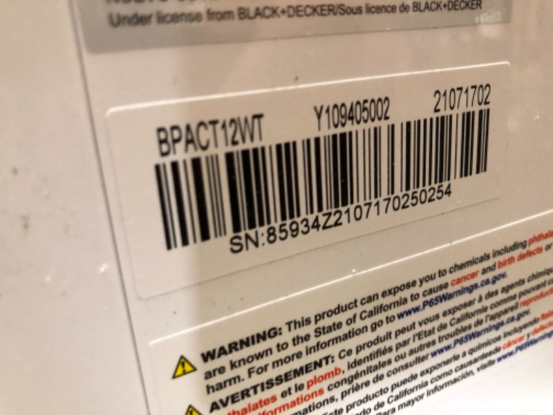 Photo 5 of BLACK+DECKER 8,000 BTU DOE (14,000 BTU ASHRAE) Portable Air Conditioner with Remote Control, White
**VENT (FAN BLADES) DAMAGED**