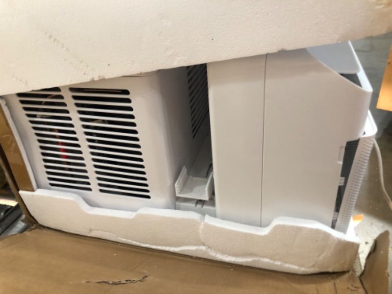 Photo 4 of **DAMAGE FRONT FACE**
Midea 8,000 BTU U-Shaped Smart Inverter Window Air Conditioner–Cools up to 350 Sq. Ft., Ultra Quiet with Open Window Flexibility,