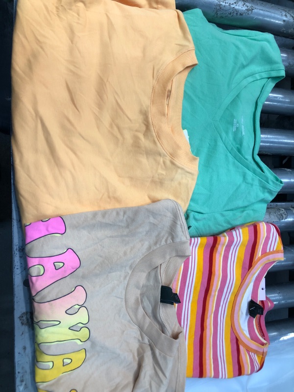 Photo 1 of Bundle of assorted XS Women's shirts (4) 