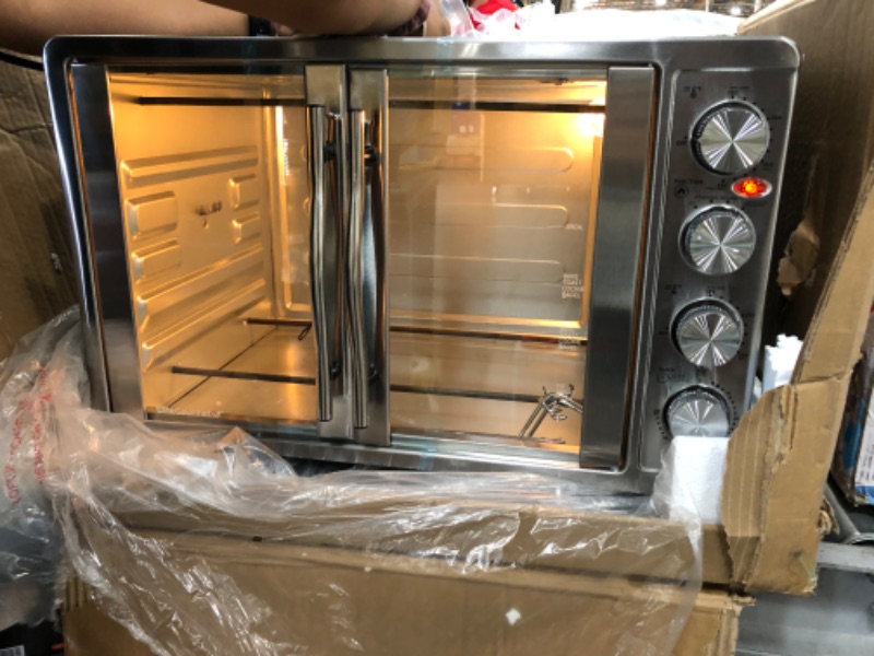 Photo 3 of Elite Gourmet ETO4510B# French Door 47.5Qt, 18-Slice Convection Oven 4-Control Knobs, Bake Broil Toast Rotisserie Keep Warm, Includes 2 x 14" Pizza Racks, Stainless Steel
