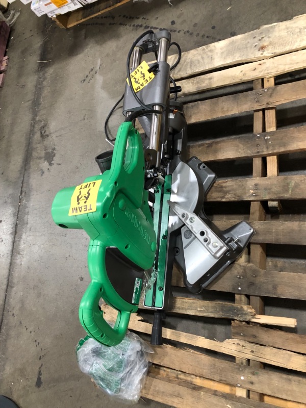 Photo 3 of **NONFUNCTIONAL**
Metabo HPT 10-Inch Sliding Compound Miter Saw, Double-Bevel, Electronic Speed Control, 12 Amp Motor, Electric Brake, 5-Year Warranty (C10FSBS)
