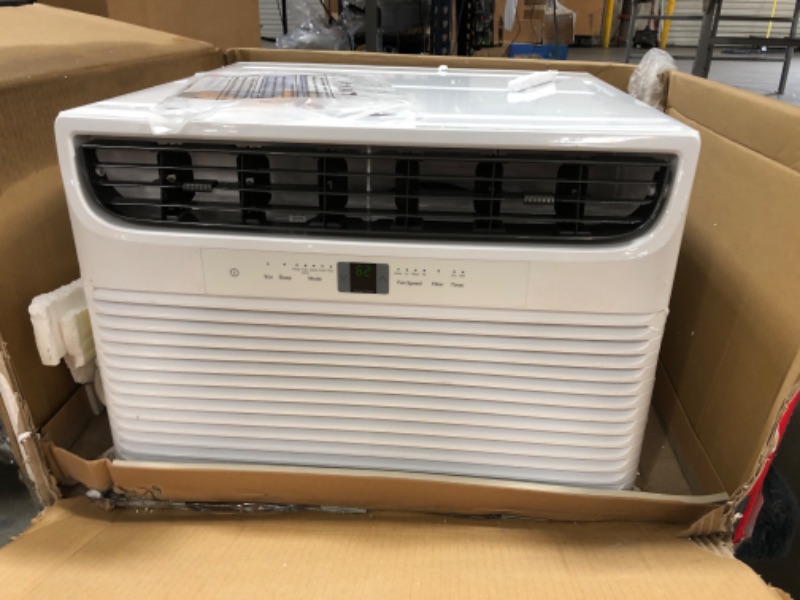 Photo 4 of (DENTED) Frigidaire 11,000 BTU Window Air Conditioner with Supplemental Heat and Slide Out Chassis, FHWH112WA1