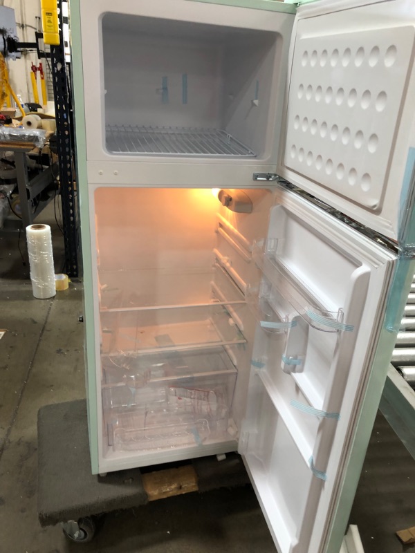 Photo 6 of (MULT. DENTS; CRACKED DOOR CORNER; DAMAGED FREEZER DOOR HINGE) Frigidaire EFR753-MINT 2 Door Apartment Size Refrigerator with Freezer, 7.5 cu ft, Retro, Mint
