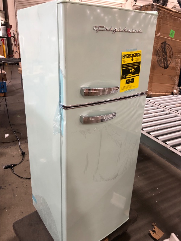 Photo 15 of (MULT. DENTS; CRACKED DOOR CORNER; DAMAGED FREEZER DOOR HINGE) Frigidaire EFR753-MINT 2 Door Apartment Size Refrigerator with Freezer, 7.5 cu ft, Retro, Mint
