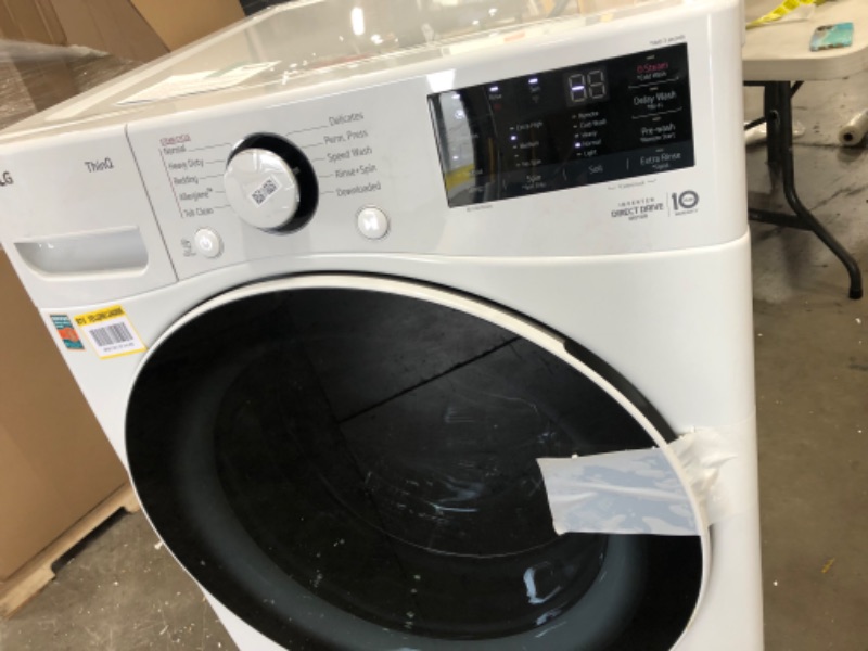 Photo 21 of ***PARTS ONLY*** MAKES LOUD NOISES, LG Electronics 27 in. 4.5 cu. ft.Ultra Large Capacity White Front Load Washer with Steam and Wi-Fi Connectivity
