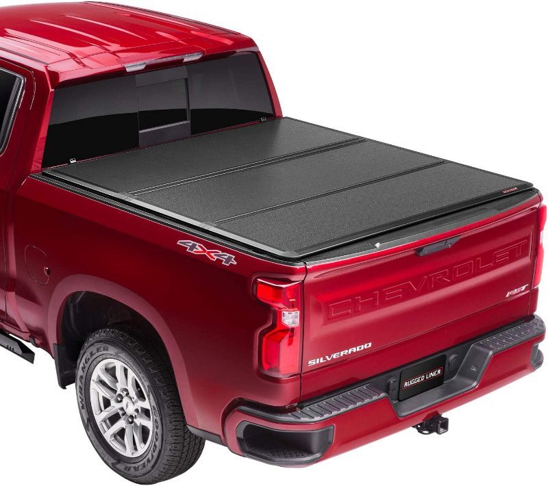 Photo 1 of **Panel is damaged**
Rugged Liner HC3 Premium Hard Folding Truck Bed Tonneau Cover | HC3-D5519 | Fits 2019 - 2021 New Body Style Dodge Ram 1500, does not work w/multi-function (split) tailgate 5' 7" Bed (67.4")
