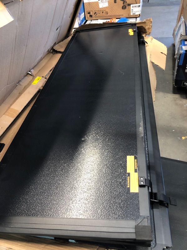 Photo 2 of **Panel is damaged**
Rugged Liner HC3 Premium Hard Folding Truck Bed Tonneau Cover | HC3-D5519 | Fits 2019 - 2021 New Body Style Dodge Ram 1500, does not work w/multi-function (split) tailgate 5' 7" Bed (67.4")