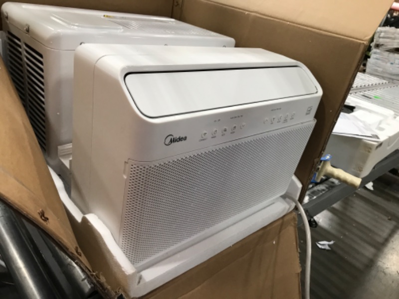 Photo 3 of ***PARTS ONLY***  Midea 8,000 BTU U-Shaped Smart Inverter Window Air Conditioner–Cools up to 350 Sq. Ft., Ultra Quiet with Open Window Flexibility, Works with Alexa/Google Assistant, 35% Energy Savings, Remote Control
19.17"D x 21.97"W x 13.46"H
