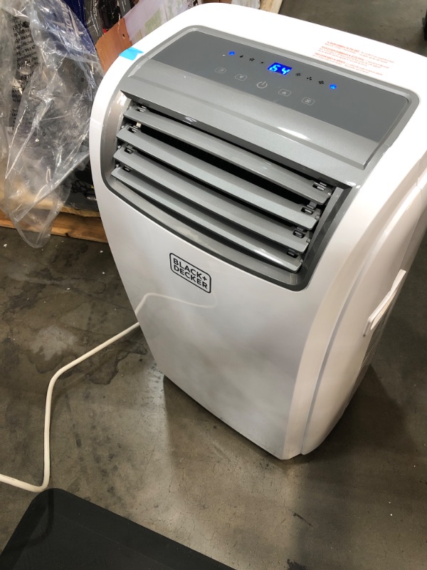 Photo 1 of BLACK+DECKER 14,000 BTU Portable Air Conditioner with Heat and Remote Control, White
