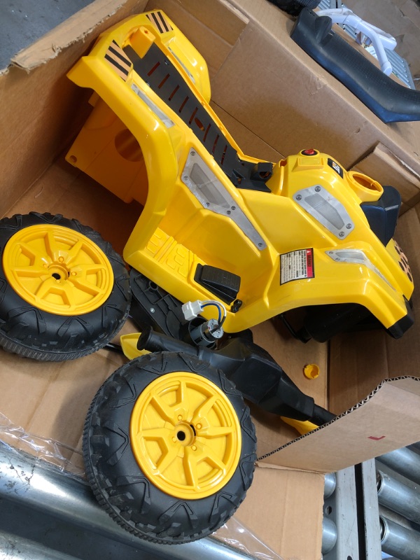 Photo 2 of Kid Trax CAT Toddler Quad Ride On Toy, 6 Volt Battery, 1.5-3 Years Old, Max Weight 44 lbs, Single Seater, Yellow (KT1575AZ)
