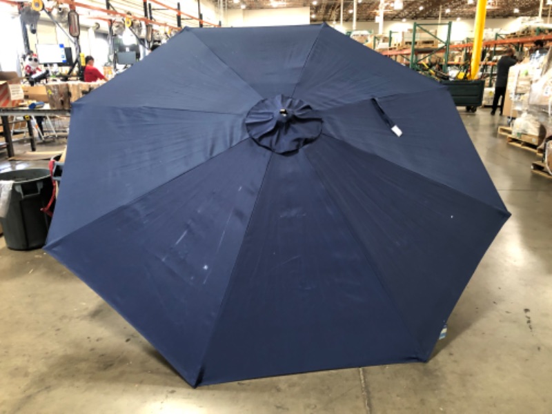 Photo 8 of (STAINED/TORN MATERIAL)10ft Solar Powered Aluminum Polyester LED Lighted Patio Umbrella w/Tilt Adjustment and UV-Resistant Fabric, Navy Blue