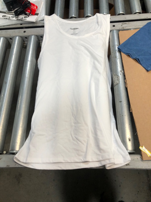 Photo 1 of 2 Pack of Varying Sized and Style Shirts (Medium V-neck & Small Tank) 