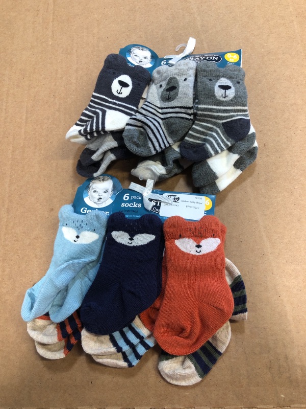 Photo 1 of 2 packs of 6 pack Baby Socks, Varying Designs