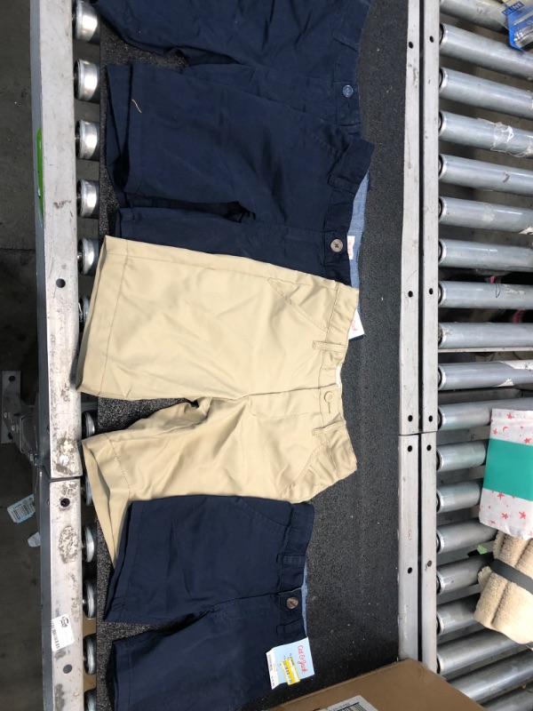 Photo 1 of Bundle of 4 assorted boy shorts Size 4 and 8.