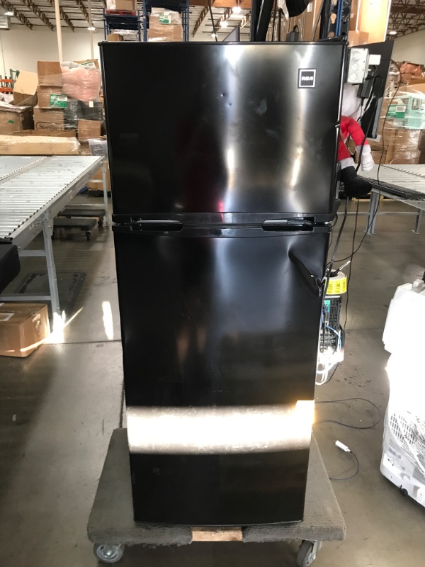Photo 1 of Damaged: RCA RFR741-BLACK Apartment Size-Top Freezer-2 Door Fridge-Adjustable Thermostat Control-Black-7.5 Cubic Feet
21"D x 21"W x 55"H
