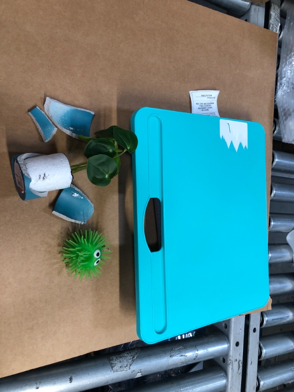 Photo 1 of 3 Pack Miscellaneous Home Items: (Padded Laptop Holder; BROKEN Potted Plant; Squishy Green Toy) 