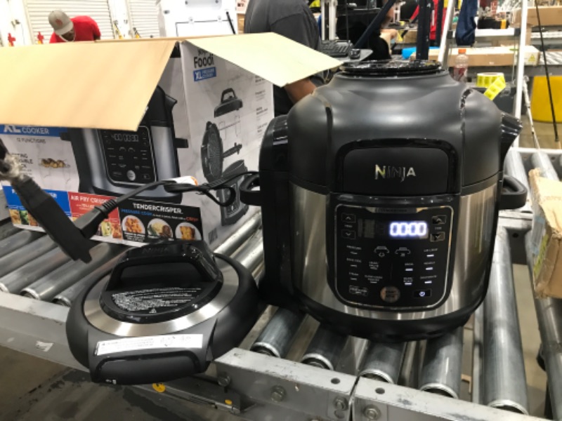 Photo 2 of Ninja OS401 Foodi 10-in-1 XL 8 qt. Pressure Cooker & Air Fryer that Steams, Slow Cooks, Sears, Sautés, Dehydrates & More, with 5.6 qt. Cook & Crisp Plate & 15 Recipe Book, Silver
