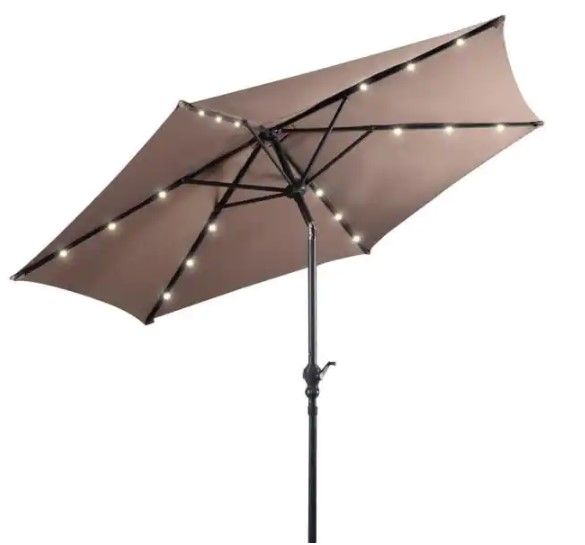 Photo 1 of 9 ft. Steel Market Solar Tilt Patio Umbrella with Crank and LED Lights in Tan
