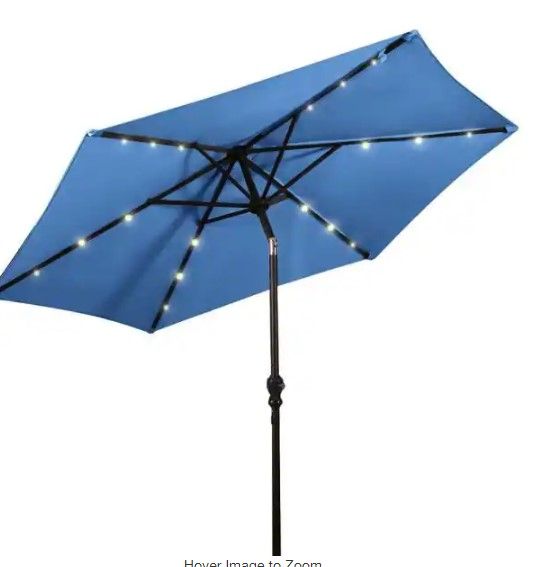 Photo 1 of 9 ft. Steel Market Solar Tilt Patio Umbrella with Crank and LED Lights in Blue
