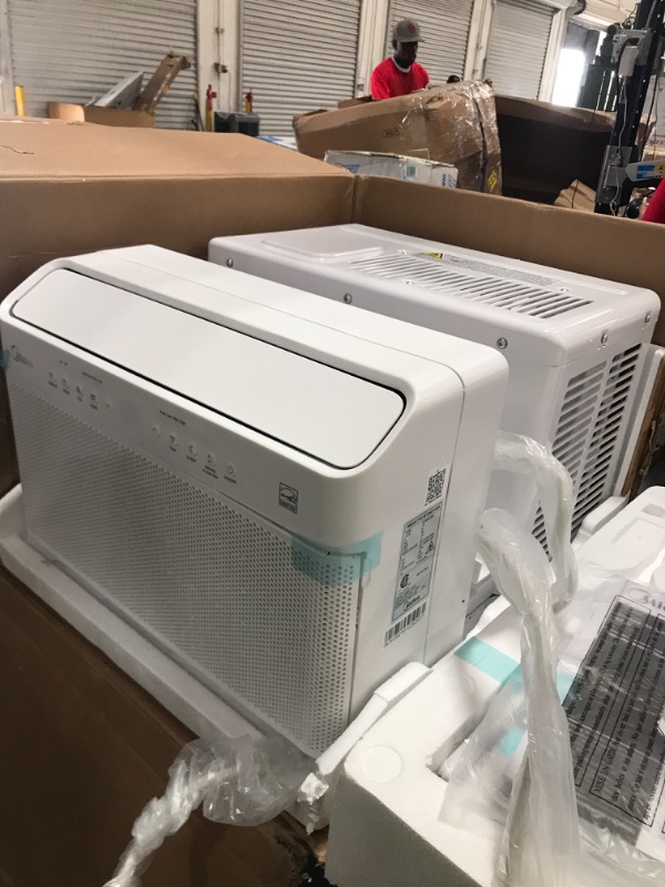 Photo 1 of Midea 8,000 BTU U-Shaped Smart Inverter Window Air Conditioner–Cools up to 350 Sq. Ft., Ultra Quiet with Open Window Flexibility, Works with Alexa/Google Assistant, 35% Energy Savings, Remote Control
