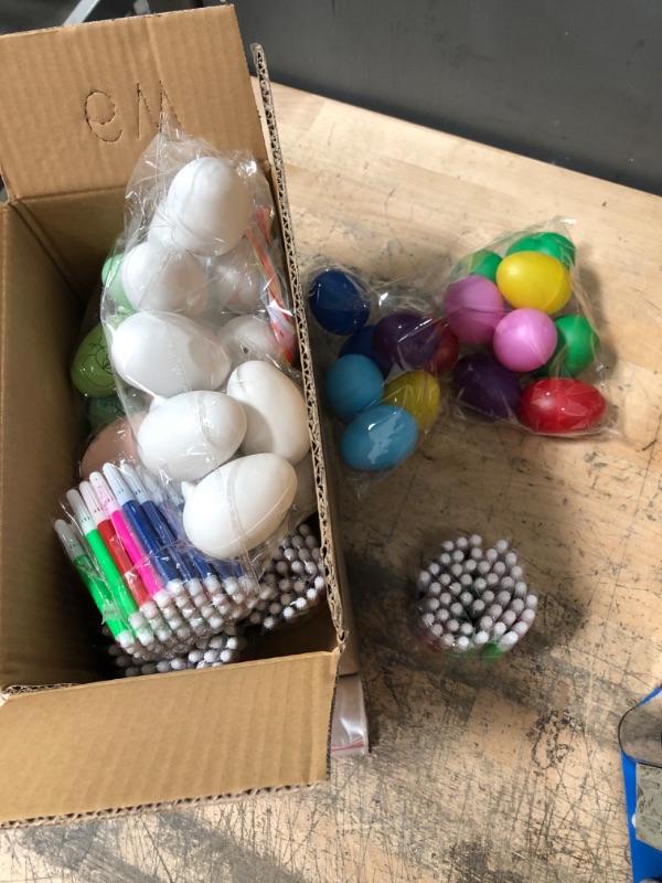 Photo 2 of ASSORTED EASTER EGGS PLASTIC WITH MARACA EGGS AND MARKERS