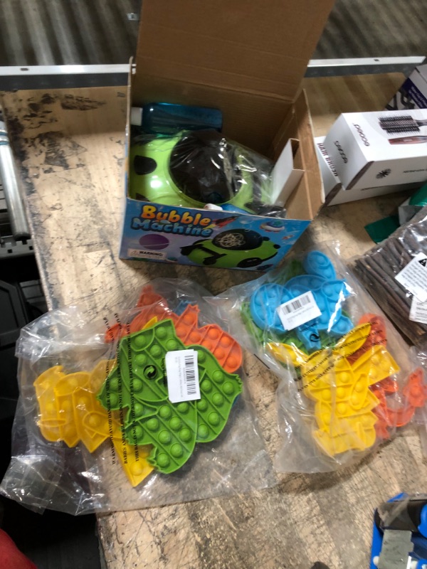 Photo 3 of (3 ITEM BUNDLE) KIDS BUBBLE MACHINE AND 2 BAGS OF 4 POKEMON SHAPED POP-IT FIDGET TOY STRESS RELIEF 