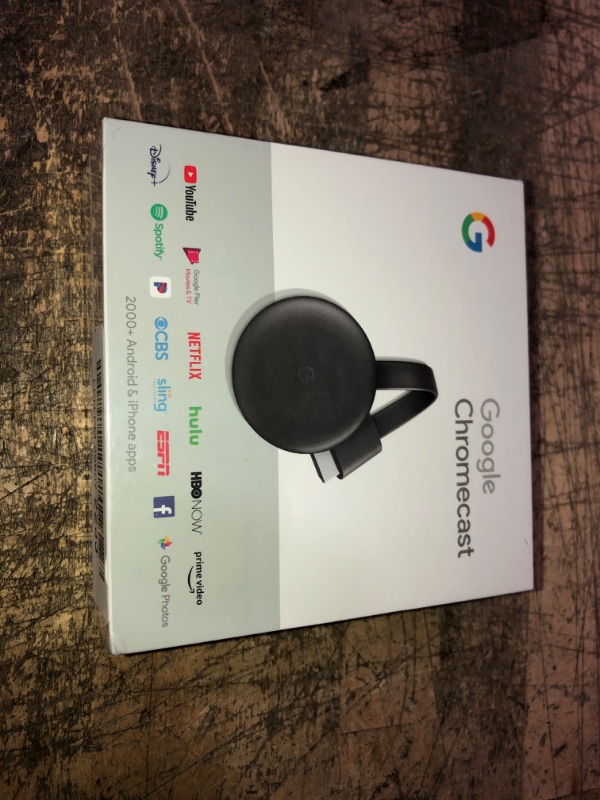 Photo 2 of Google Chromecast - Streaming Device with HDMI Cable - Stream Shows, Music, Photos, and Sports from Your Phone to Your TV
