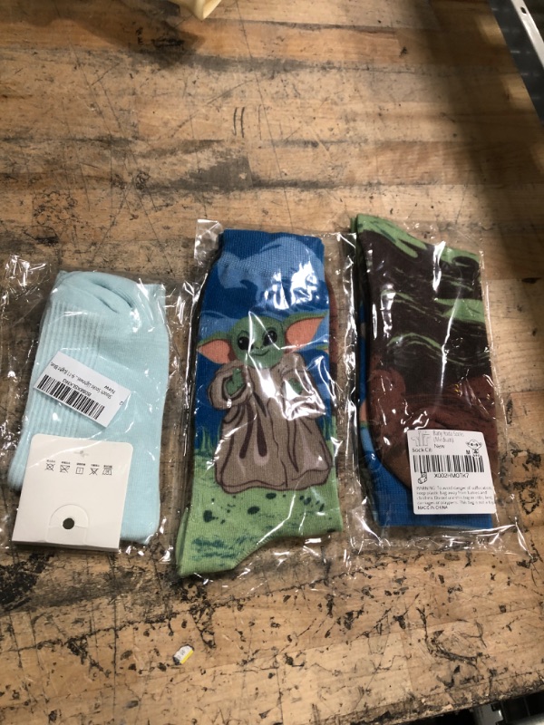 Photo 1 of Sock Bundle of 3 
9-11 Light Blue Socks, Medium Baby Yoda Socks 